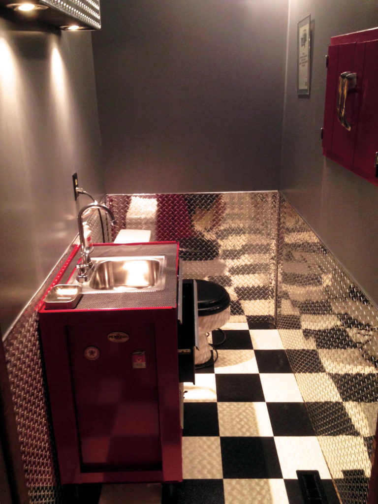 Bathroom using diamond plate from The Metal Link